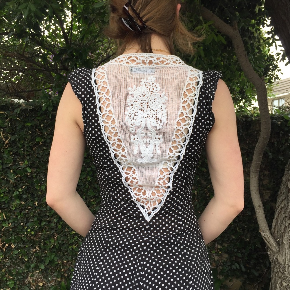 Lúcuma black and white polka dot romper with lace